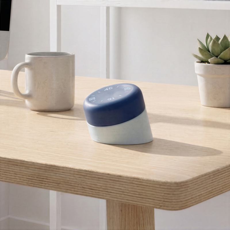 Blue capped lamp on a wooden desk