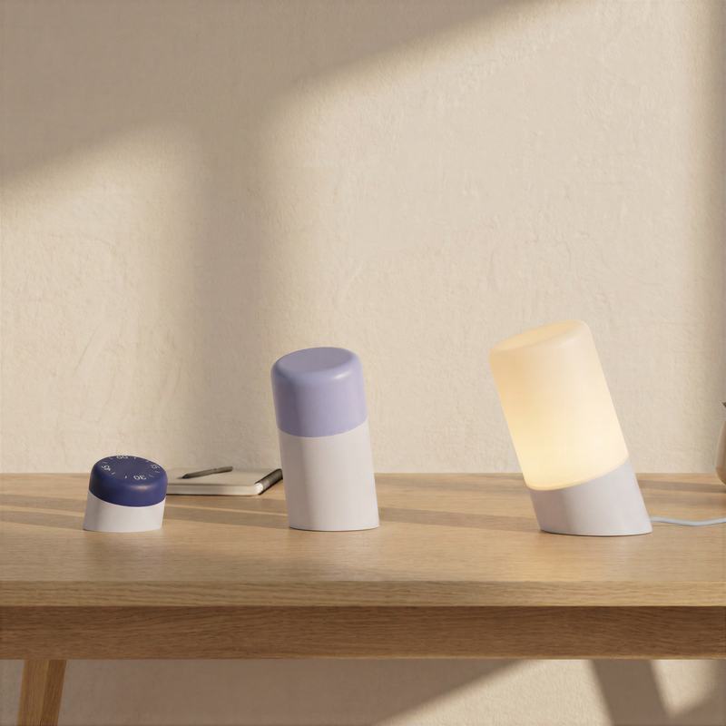 Trio of lamps on a sunlit shelf